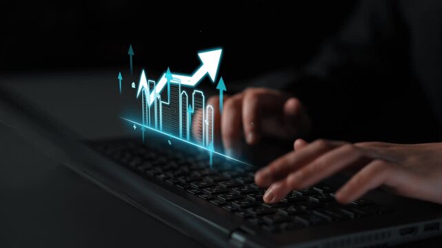 Person Typing on Laptop with Digital Graph and Growth Arrows Representing Financial Success and Business Analytics in Modern Workspace. Entropy.