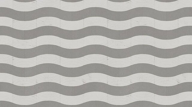 Grey wavy paving stone pattern creates a seamless loop background.