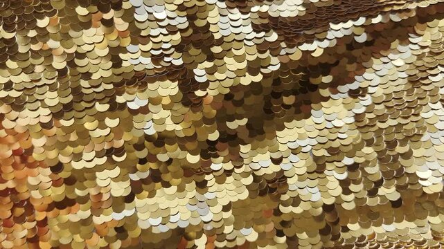 Gold sequin texture background and reflective sparkling sunlight Abstract christmas backdrop