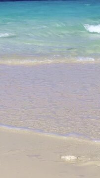Clear Turquoise Water and Sand at the Beach
