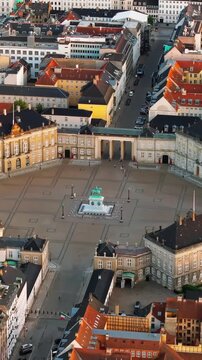 Aerial view amalienborg square with equestrian statue of frederick v and surrounding buildings.