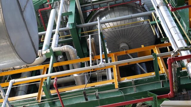High-tech industrial facility with sophisticated engineering structures, interconnected pipelines, pressure vessels, processing units, and intelligent automation systems, representing innovation, oper