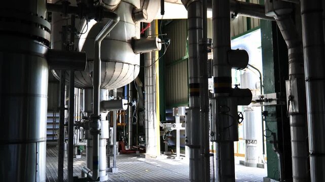 Modern chemical processing plant featuring advanced engineering design, complex piping systems, storage tanks, structural steel, and automated process control equipment. Ideal for industrial engineeri
