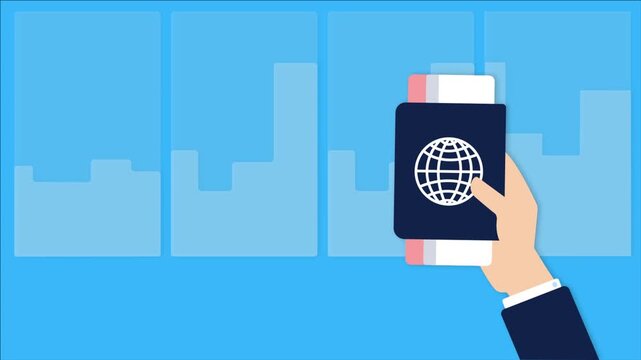 Business person holding a passport with airplane tickets in an airport terminal.