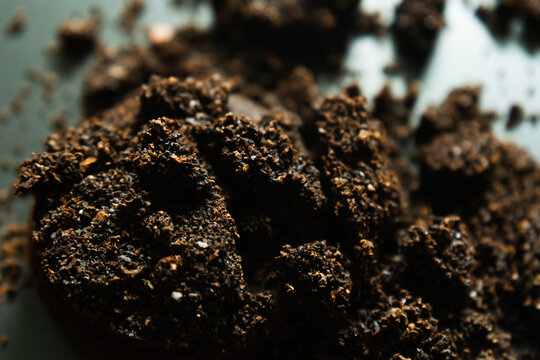 Used Coffee Grounds Waste Texture Close Up for Organic Garden Fertilizer and Recycling Concept