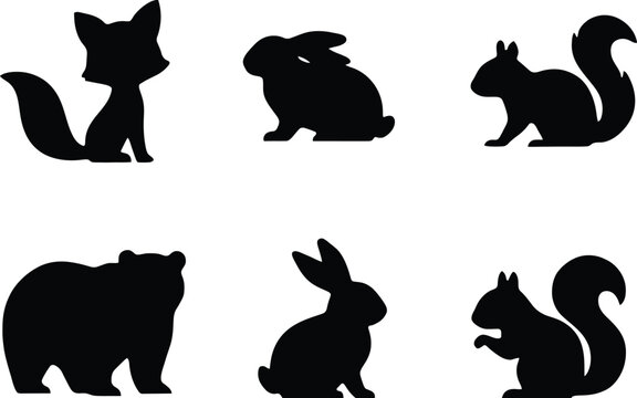 A collection of black silhouettes featuring various woodland animals including a fox a rabbit a bear and a squirrel