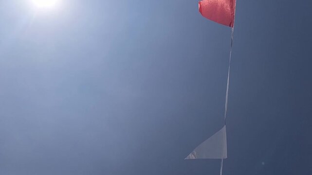 Red and White Bunting Flags Hanging Along Street for Indonesian Independence Day