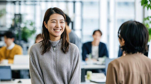 Friendly Conversation in Modern Office Scene with Diverse Workers
