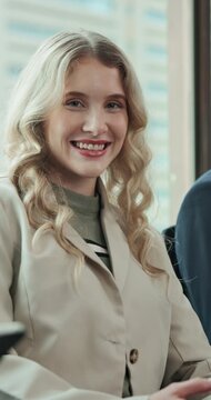 Happy, queue and face of businesswoman in office for job interview, meeting or corporate training. Smile, portrait and candidate in line for career opportunity, vacancy or recruitment in workplace.