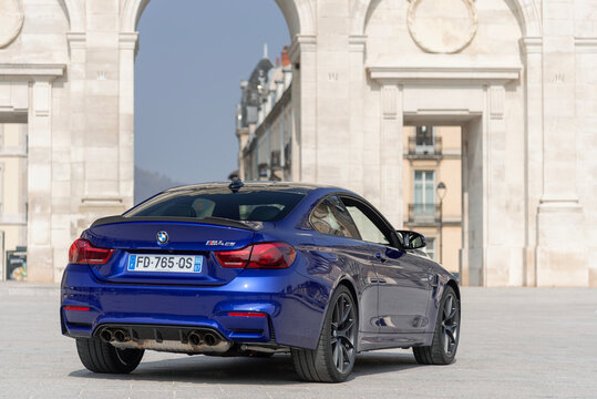 Nancy, France - March 24th 2019 : View on a blue BMW M4 F82 finished in San Marino Blue parked on a street.