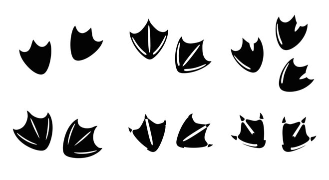 Set of black duck footprints on a white background
