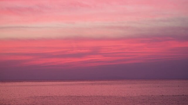Beautiful Pink Sunset over the Ocean with Calm Sea and Colorful Evening Sky, Japan Nature Landscape, 4K Video
