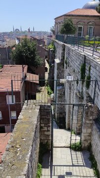 ISTANBUL, TURKEY - 06 MAY 2026: A stroll through the old streets of Istanbul with a view of the Bosphorus. Beautiful narrow streets with a rich cultural heritage.