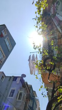 ISTANBUL, TURKEY - 06 MAY 2026: A stroll through the old streets of Istanbul with a view of the Bosphorus. Beautiful narrow streets with a rich cultural heritage.