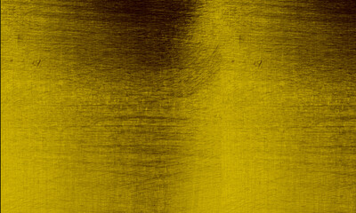 Naklejka premium Gold metal texture background. Brushed yellow metallic surface with shiny light reflections.
