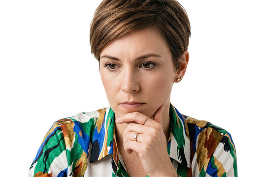 Woman is thinking with hand on chin in a clean white background. Her serious expression suggests contemplation. Concept of business, mental health, decision making