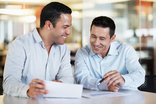 Smile, people and lawyer in meeting with document, case file and witness statement for legal trial. Attorney, team and review paperwork for evidence, lawsuit investigation and agenda for court summon