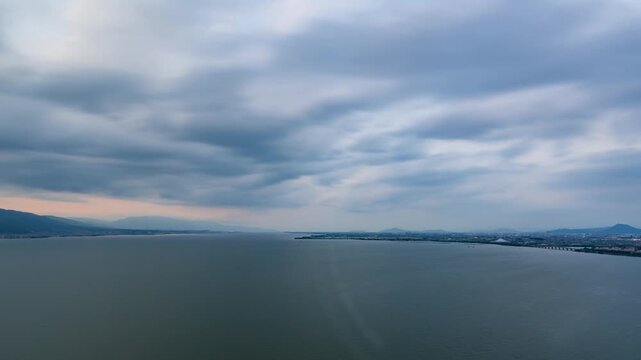 Timelapse footage of Lake Biwa transitioning from magic hour sunset to peaceful nightscape.