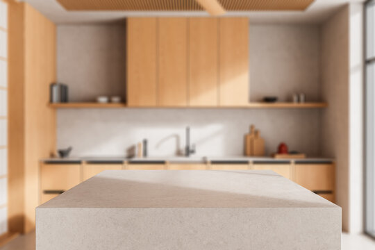 Warm minimalist kitchen interior with wood cabinetry, stone island, soft focus styling, and contemporary architectural design for home inspiration. 3D Rendering