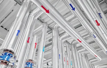 Heat pump piping installation at a district heating plant. © MaciejBledowski