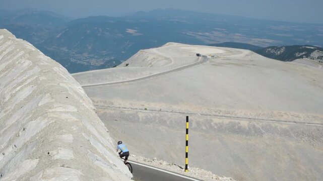 Blurred view from the mountaintop observation deck of Mont Ventoux, Provence, France. Extreme summer heat. Iconic road cycling challenge. Minimal. Copy Space.