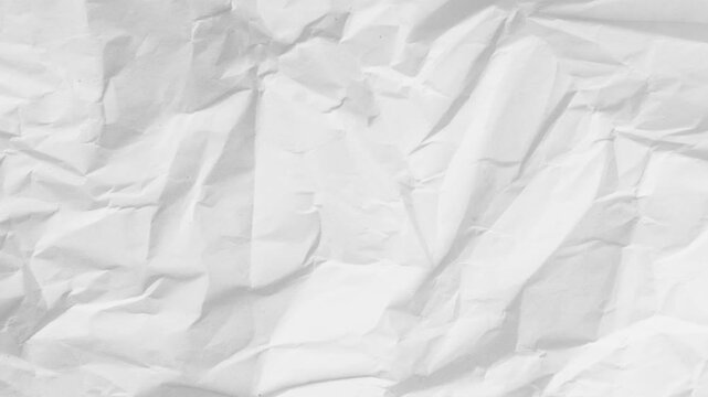 Crumpled white paper texture with varied layers showing depth and subtle shadows in folds