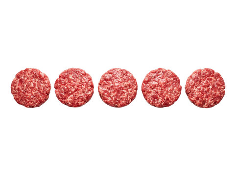 Raw beef burger patties in a row, fresh minced meat rounds for grilling and BBQ, butchery product isolated on black for menu design and advertising