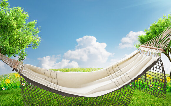 a relaxing on hammock in backyard in spring flowers and grass garden