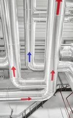 Heat pump piping installation at a district heating plant. © MaciejBledowski