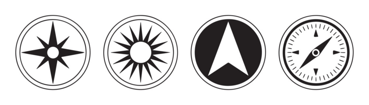 Set of navigation symbols compass roses arrow and sunburst isolated on transparent.