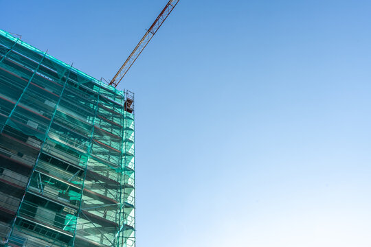 Building Construction Crane Scaffolding Green Safety Net Blue Sky Development