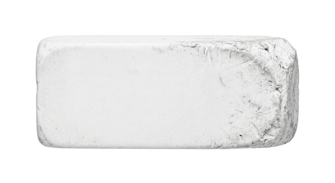 Well-used white eraser with textured edges on a clean white background