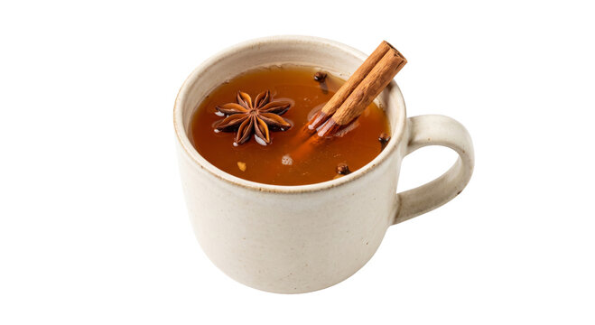 Warm spiced cider in a rustic mug with cinnamon stick and star anise