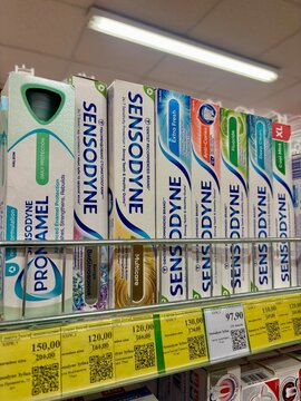 26.07.2026 Ukraine, Kharkov Sensodyne Toothpaste Boxes Displayed on Supermarket Shelf