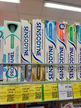 26.07.2026 Ukraine, Kharkov Sensodyne Toothpaste Boxes Displayed on Supermarket Shelf