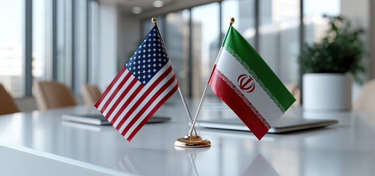 Miniature US and Iran flags on a table symbolizing international diplomacy and peace talks in a modern meeting room.