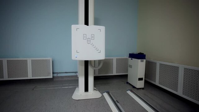 Medical imaging panel features alignment graphics in sterile room. Quiet clinical atmosphere reflects advanced healthcare standards