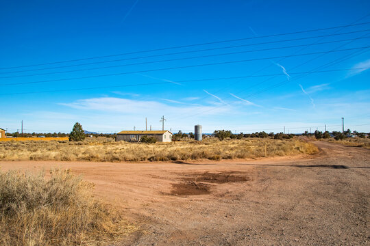 Remote Rural Settlement with Dirt Roads and Power Lines