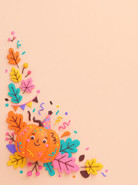 cute clay party pumpkin with autumn leaves and confetti border