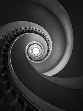 Monochrome architectural spiral viewed from below