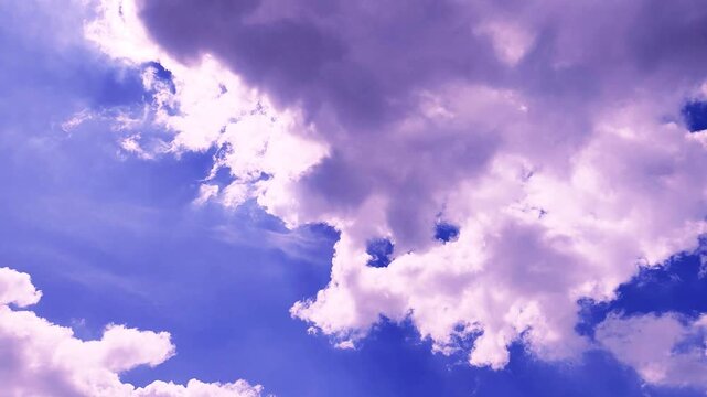 Dramatic Purple Tinted Clouds and Sky in Bright Sunlight