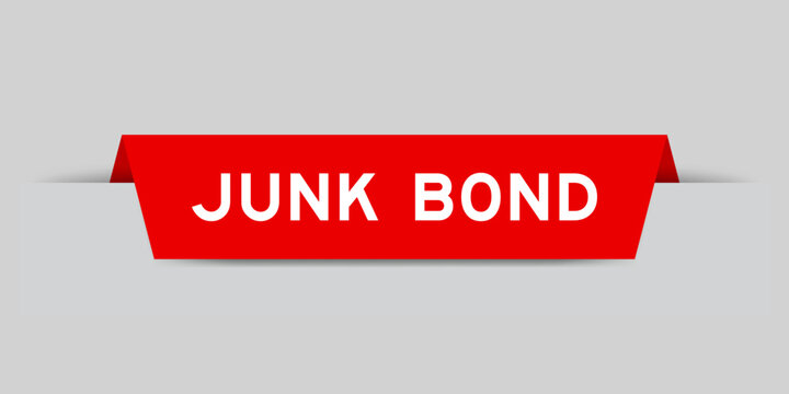 Red color inserted label with word junk bond on gray background