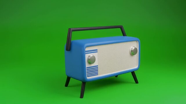 Retro blue transistor radio rotating with handle up in studio lighting against a green screen background