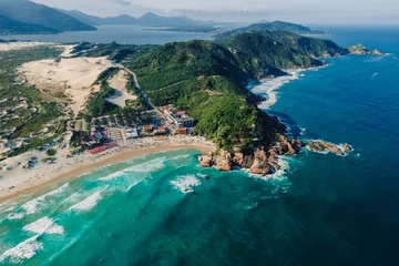 Joaquina beach with scenic landscape and ocean in Brazil. Aerial view © artifirsov