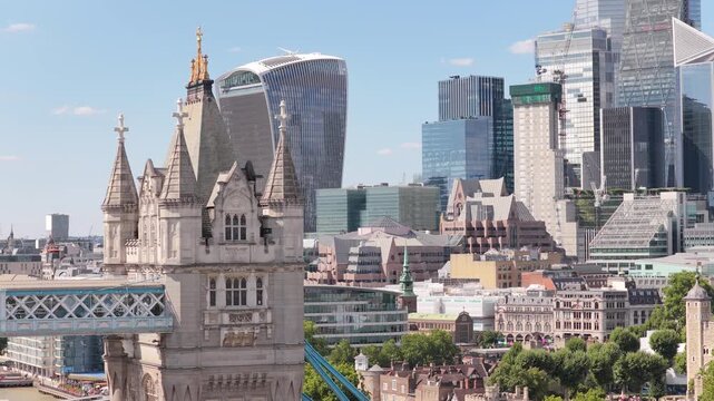 Tower Bridge and Modern Skyscrapers in the London Skyline During a Clear Sunny Afternoon