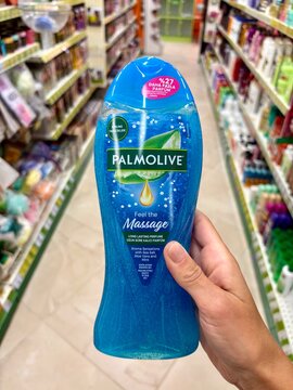 01.08.2026 Ukraine, Kharkov Woman Holding Palmolive Shower Gel Bottle in Supermarket
