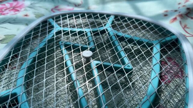 Electric Mosquito Swatter Racket Grid Close Up