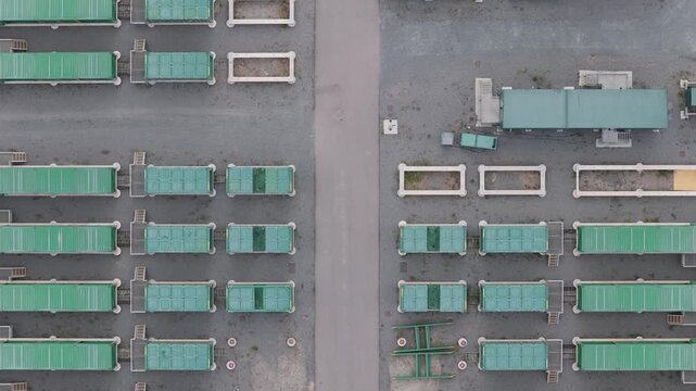 Aerial View of a Large Battery Energy Storage Site During the Day With Power Units