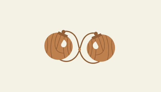 Traditional wooden castanets with white water droplet symbols are displayed against a plain off-white background in a clean style.