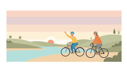 Fototapeta premium Active senior couple riding their bicycles along scenic river path during beautiful warm sunset.